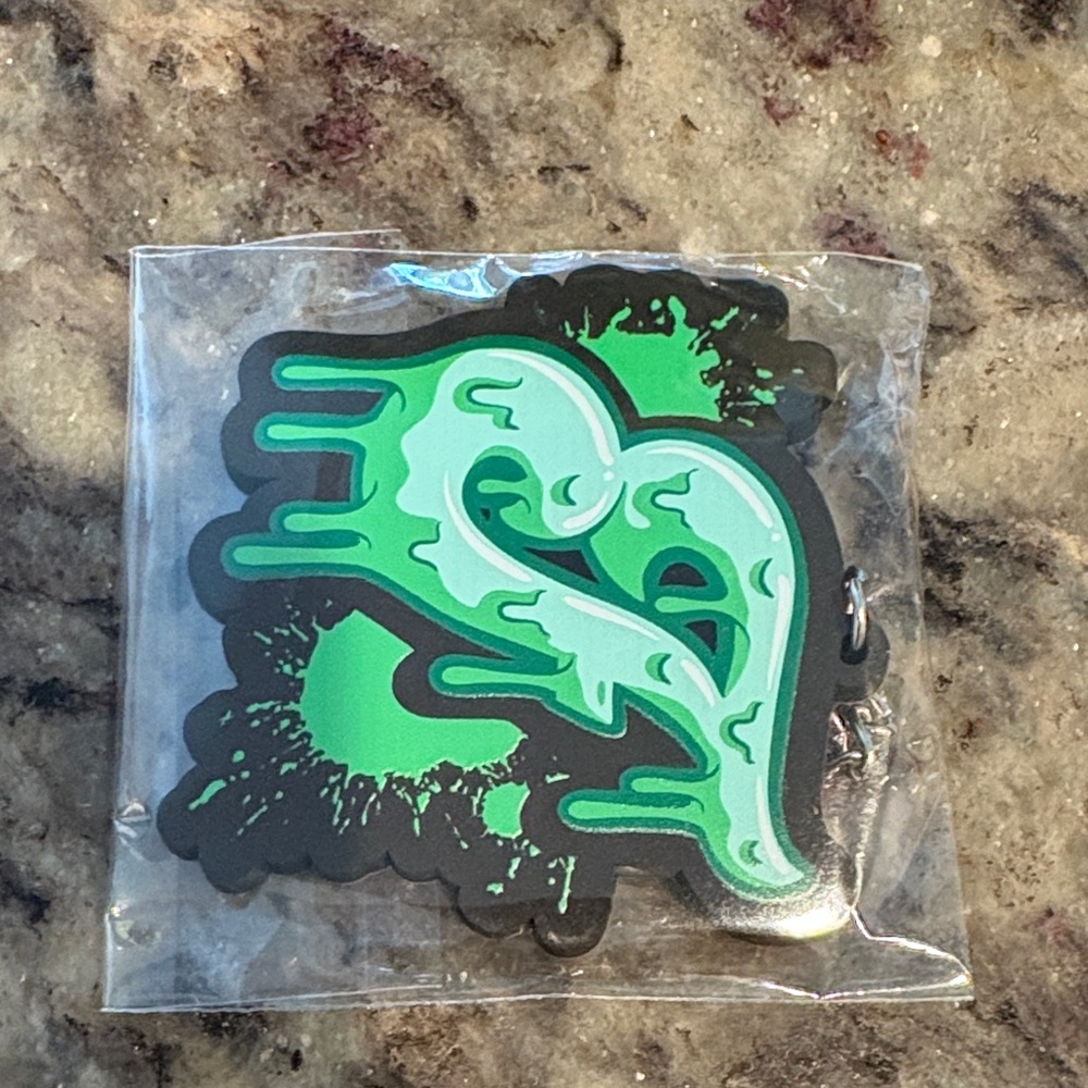 Vibrant Green and Black Drip Sticker